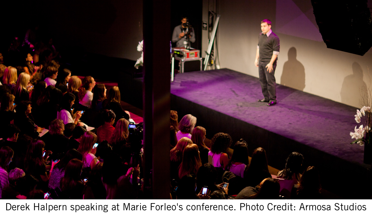 Derek Halpern speaking at Marie Forleo's conference. Photo credit: Armosa Studios.